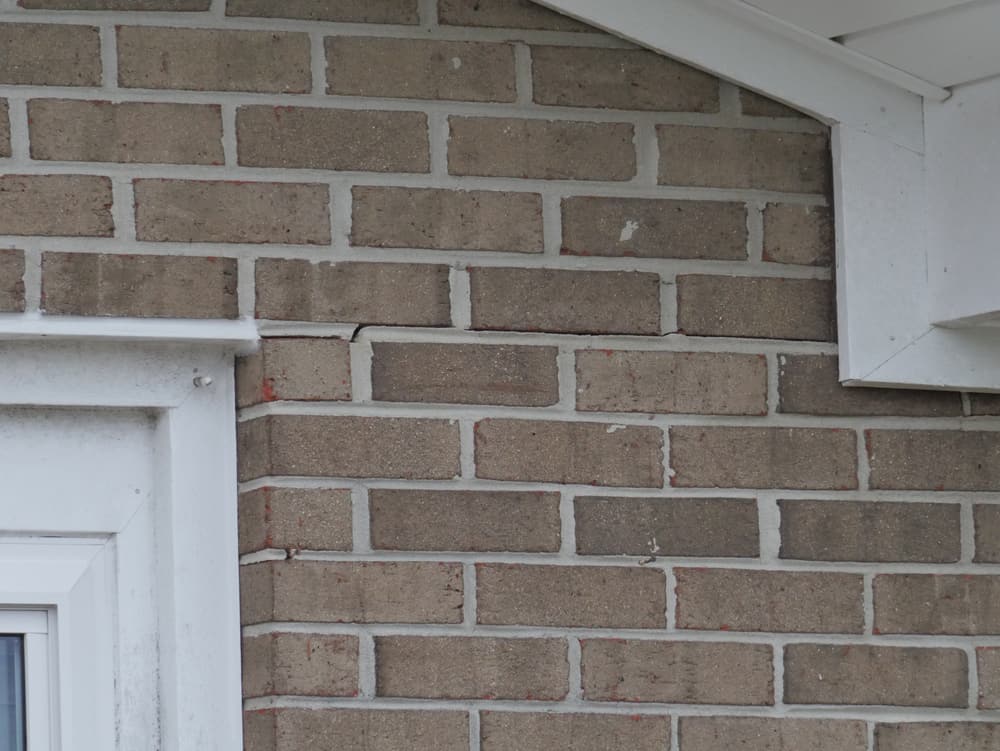 Foundation Cracks In Brick Mortar Concrete Of House Or Building
